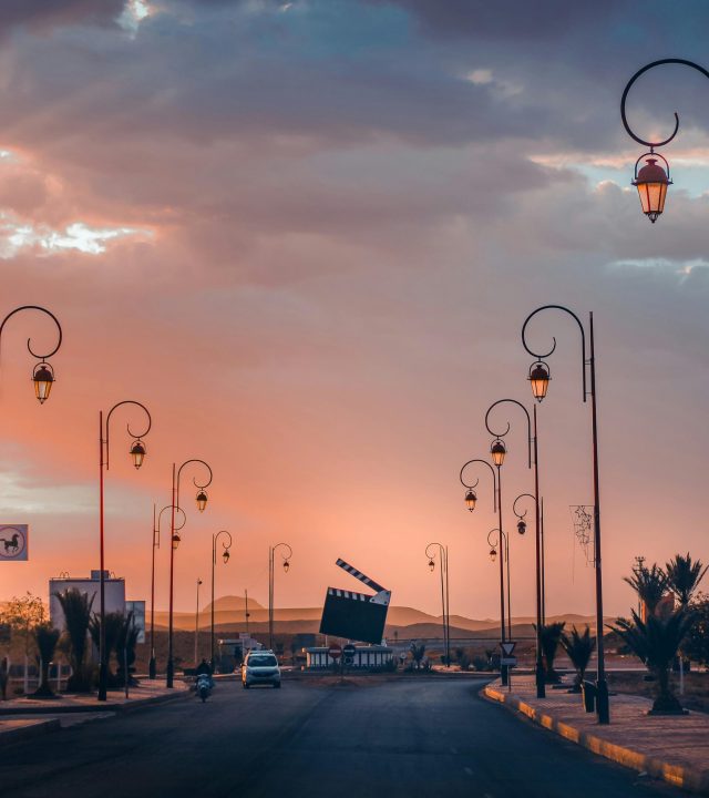 Explore the cinematic streets of Ouarzazate, Morocco, under a stunning sunset glow.