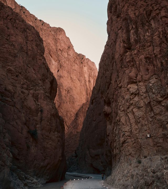 Discover the breathtaking beauty of Todgha Gorge in Morocco with towering rock formations at sunrise.
